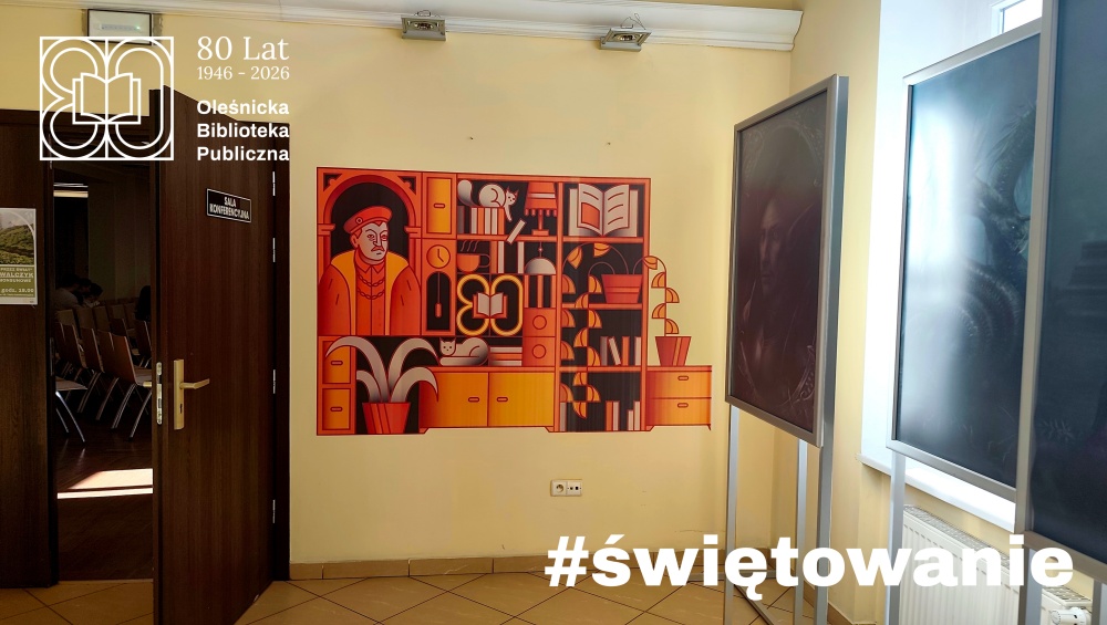 Zdjęcie przedstawiające jubileuszowy mural w holu biblioteki
